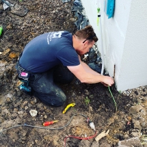 Fitting an earth stake in the ground for a new build
